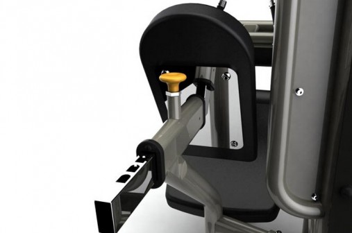 Тренажер для спортзалов на сгибание ног сидя.