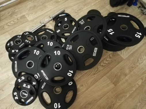 Олимпийский диск в уретане PRECOR New 1,25 кг